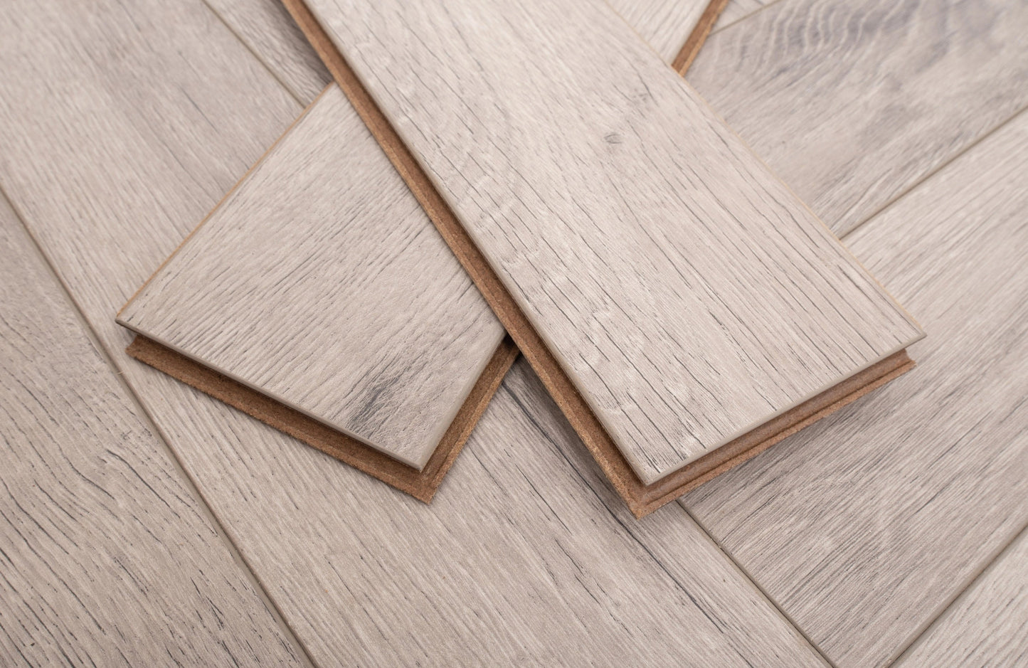Kingsley 8mm Grey Oak Herringbone Laminate Flooring
