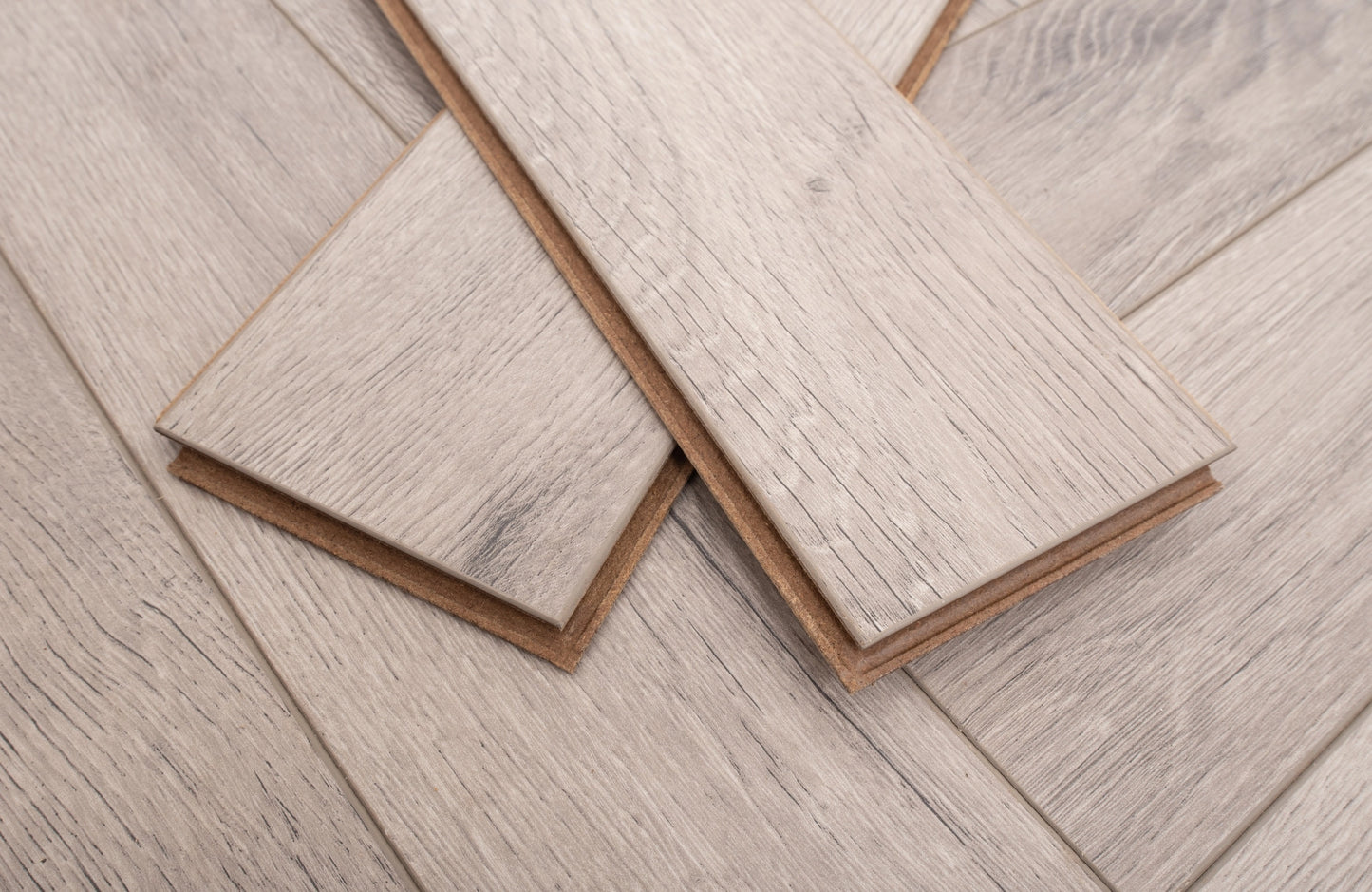 Kingsley 8mm Grey Oak Herringbone Laminate Flooring