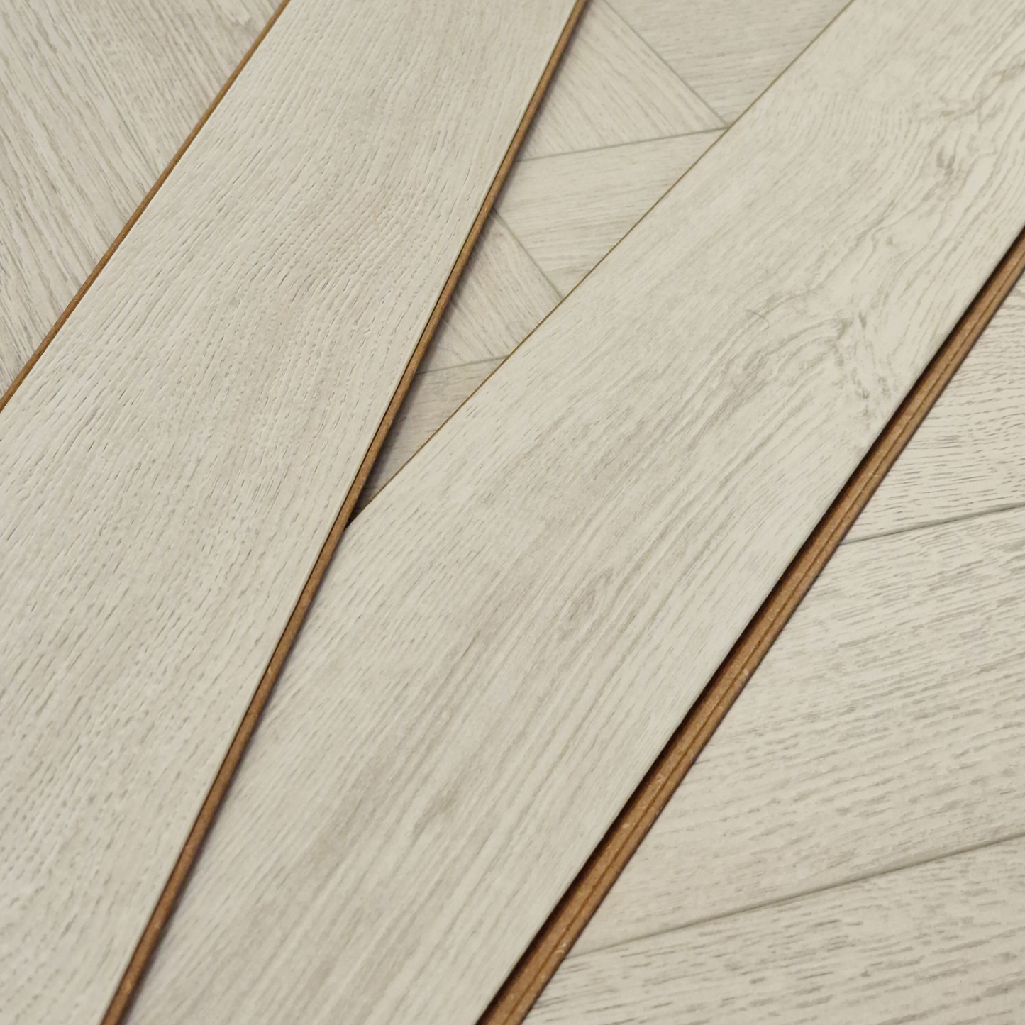 Kingsley 8mm Ashford Oak Herringbone Laminate Flooring