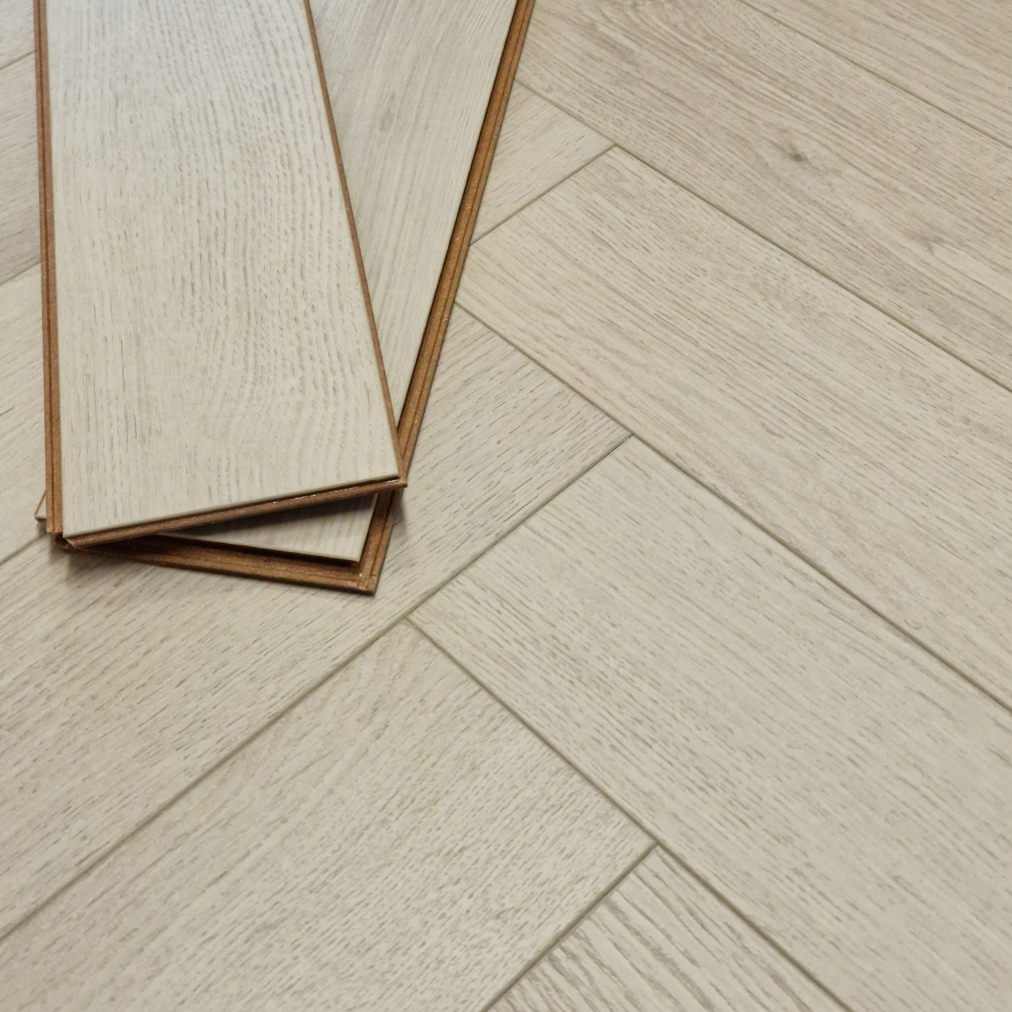 Kingsley 8mm Ashford Oak Herringbone Laminate Flooring