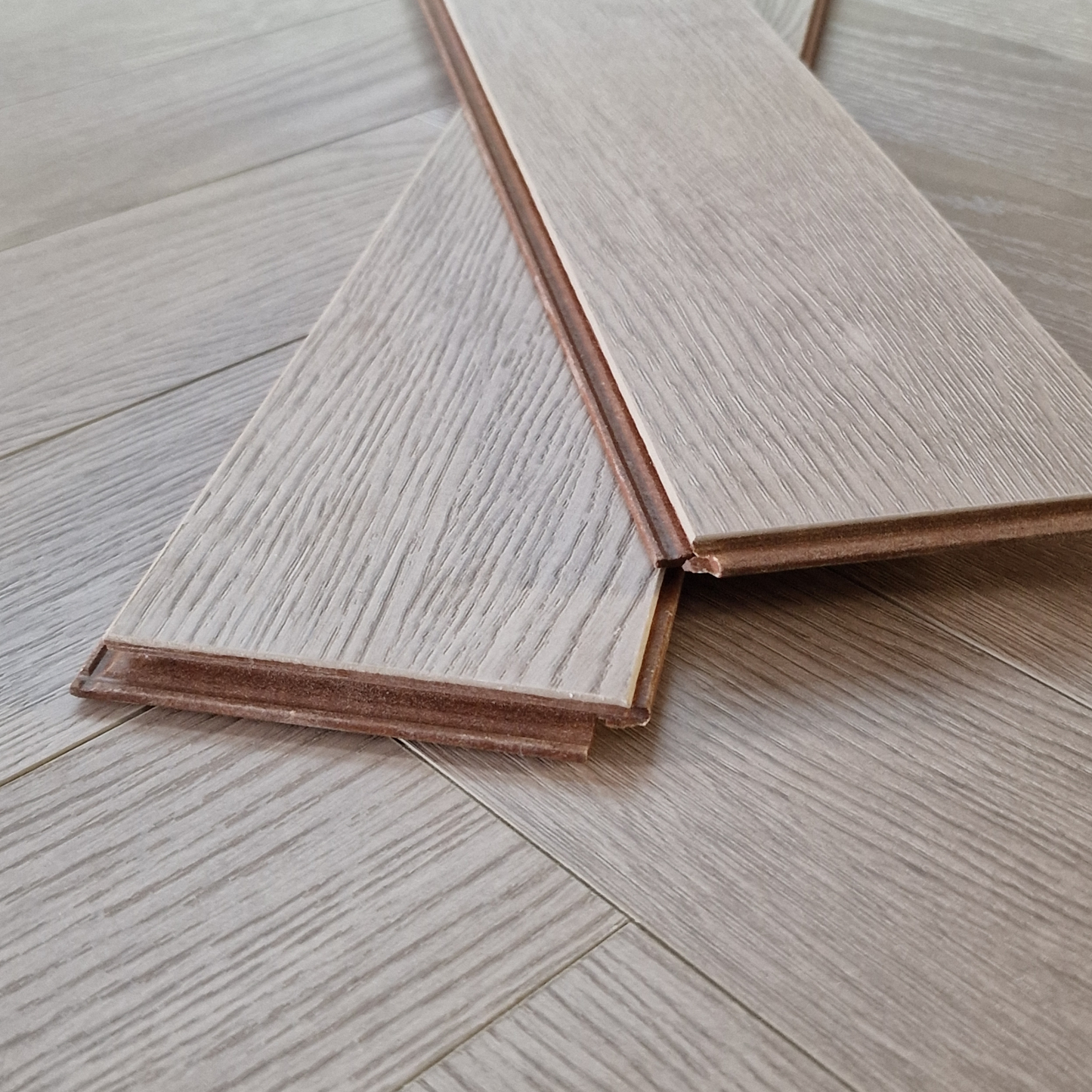 Kingsley 8mm Whitford Oak Herringbone Laminate Flooring