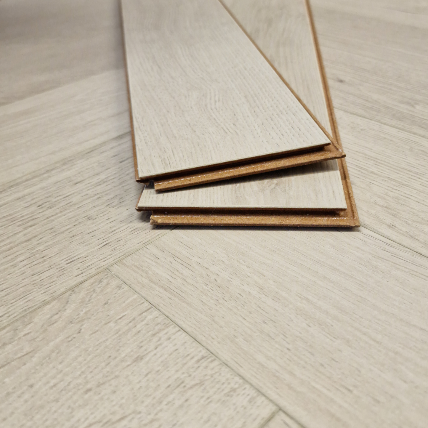 Kingsley 8mm Ashford Oak Herringbone Laminate Flooring