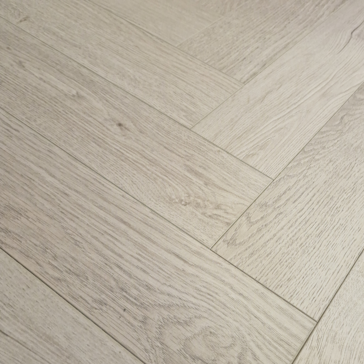 Kingsley 8mm Ashford Oak Herringbone Laminate Flooring