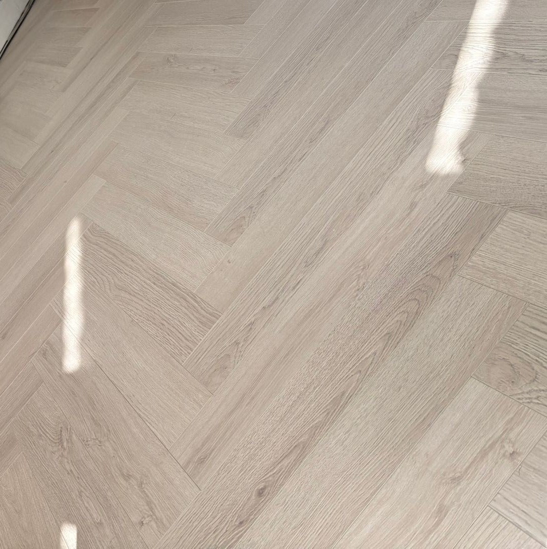 Kingsley 8mm Ashford Oak Herringbone Laminate Flooring