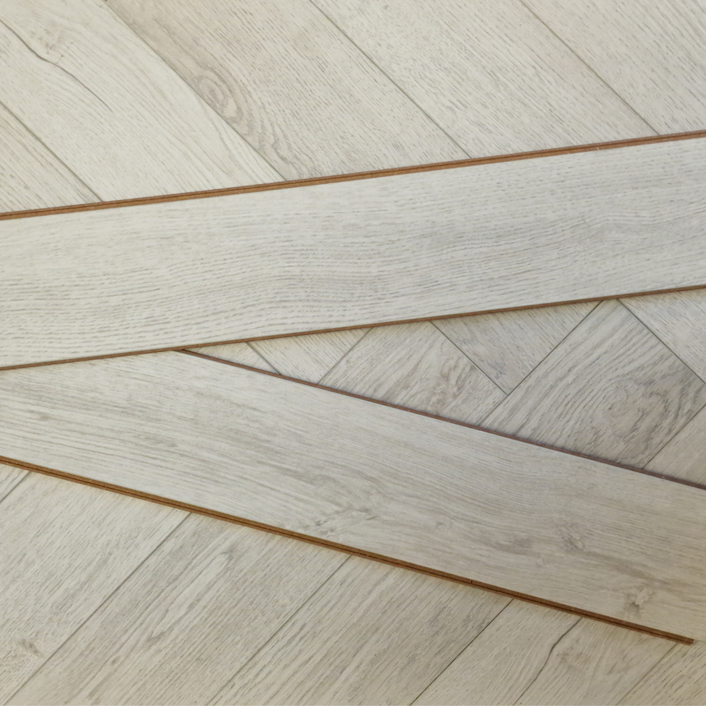 Kingsley 8mm Ashford Oak Herringbone Laminate Flooring