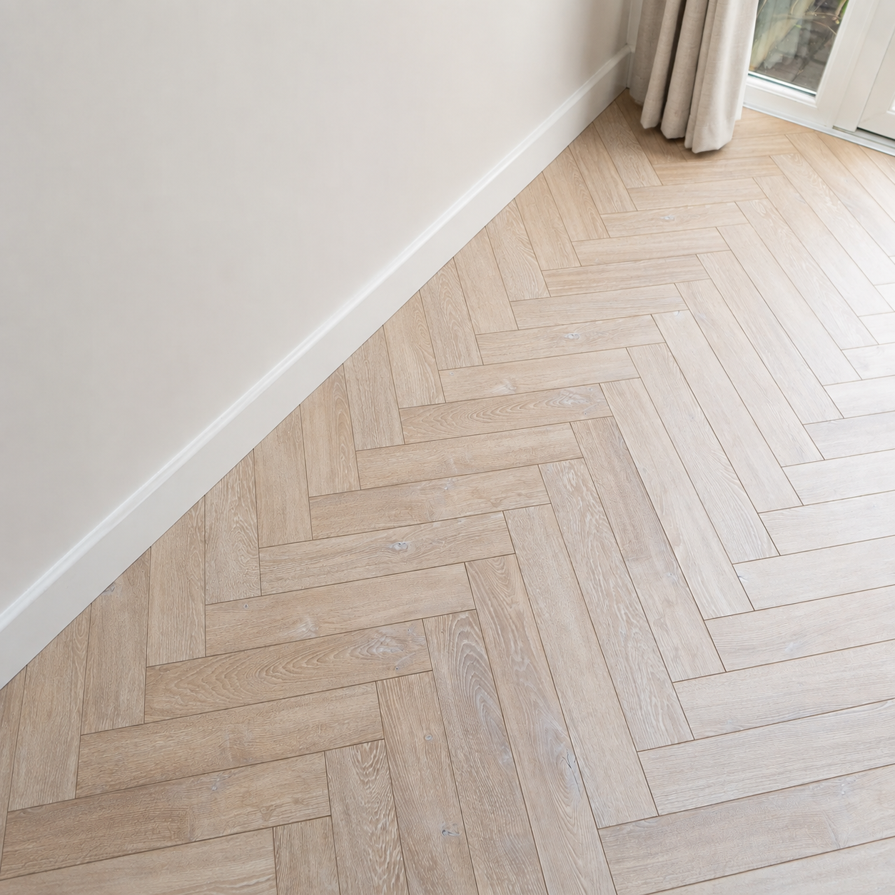 Desert Oak 8mm Herringbone Laminate Flooring