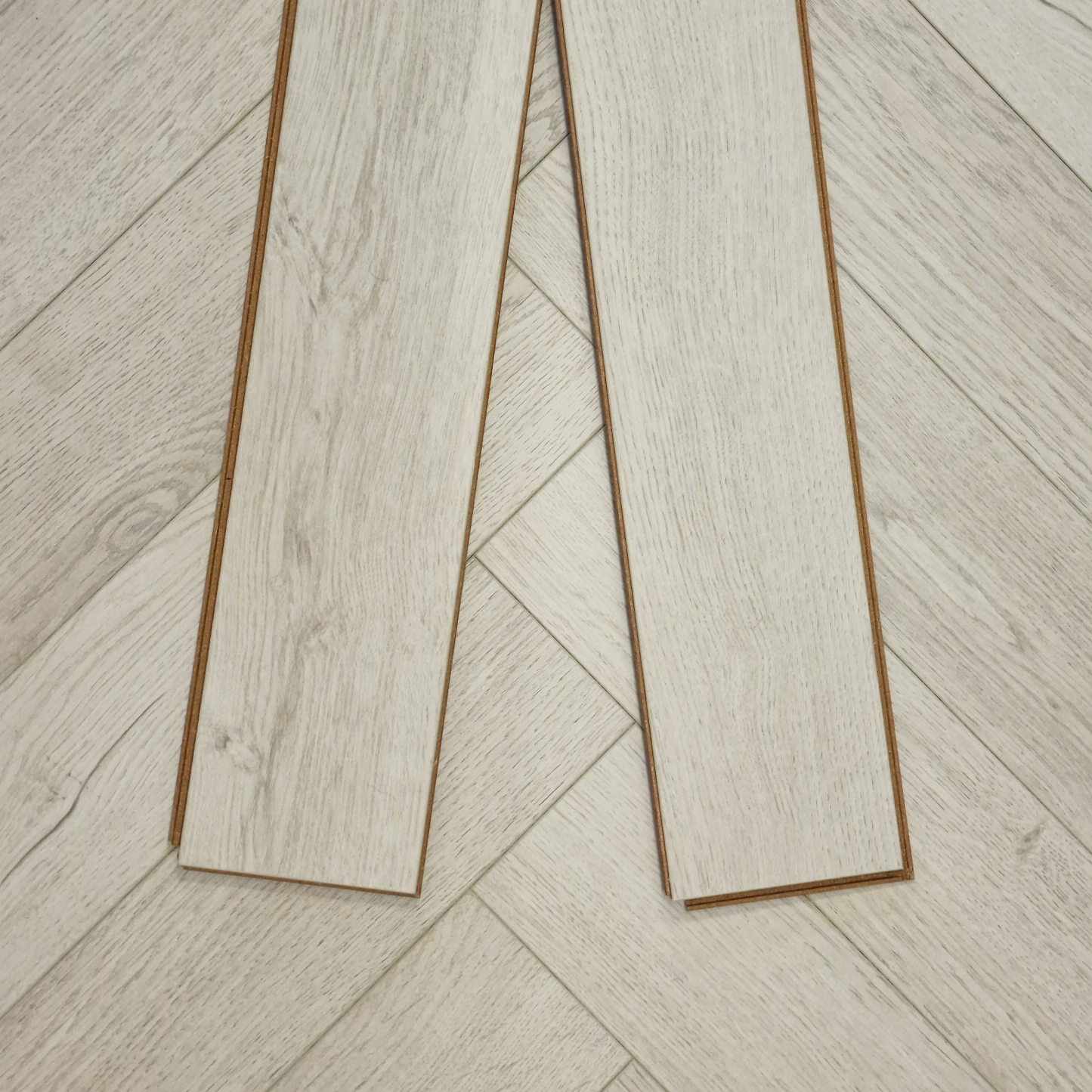 Kingsley 8mm Ashford Oak Herringbone Laminate Flooring