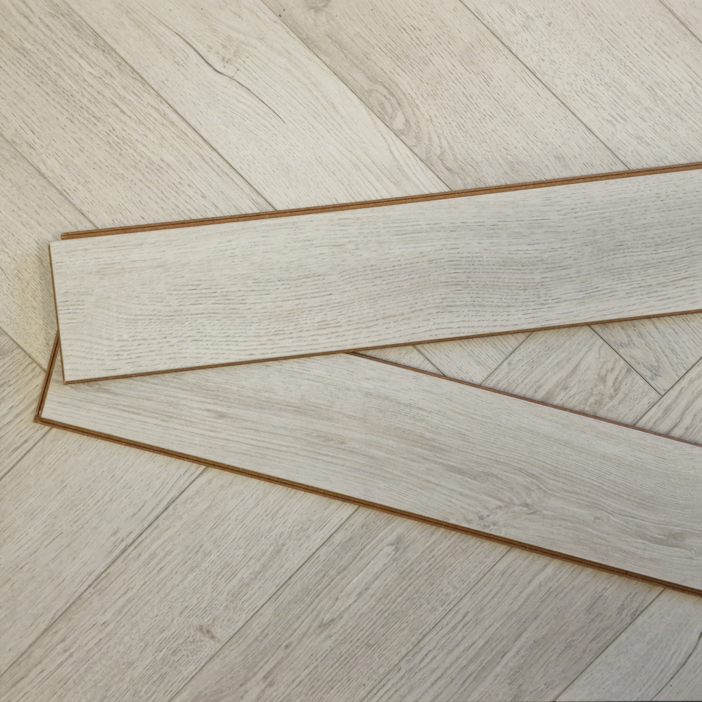 Kingsley 8mm Ashford Oak Herringbone Laminate Flooring