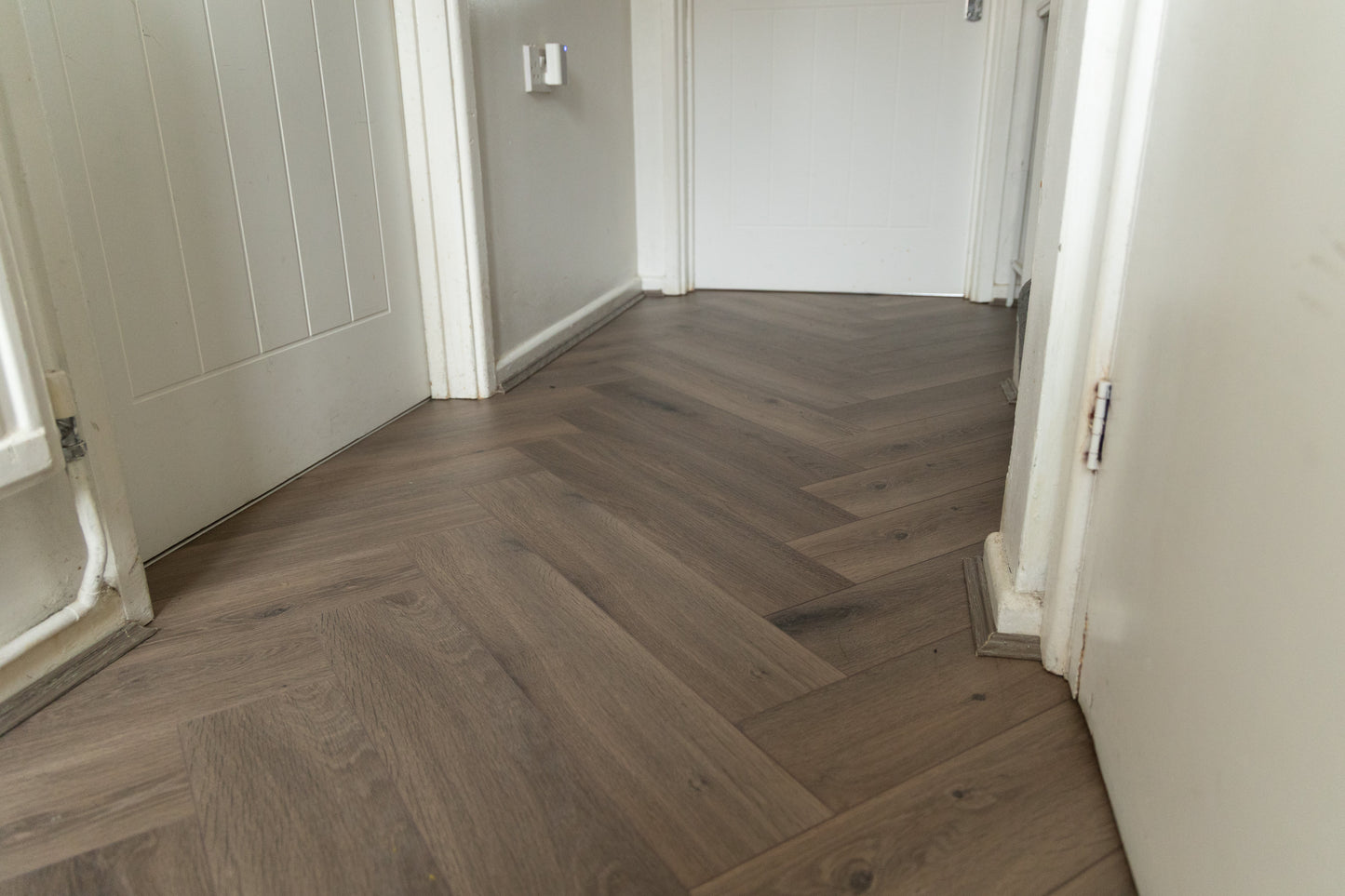Forenzo Charcoal Trufflewood Herringbone Laminate Flooring