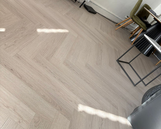 Kingsley 12mm Ashford Oak Herringbone Laminate Flooring