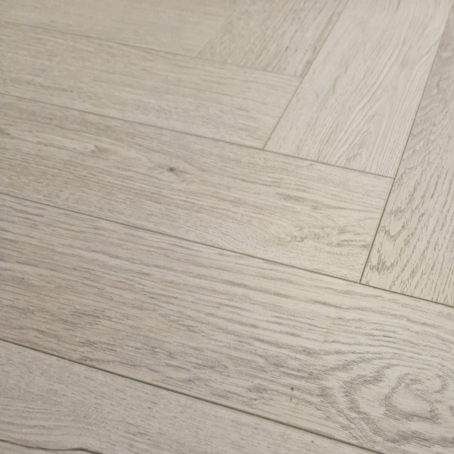 Kingsley 8mm Ashford Oak Herringbone Laminate Flooring