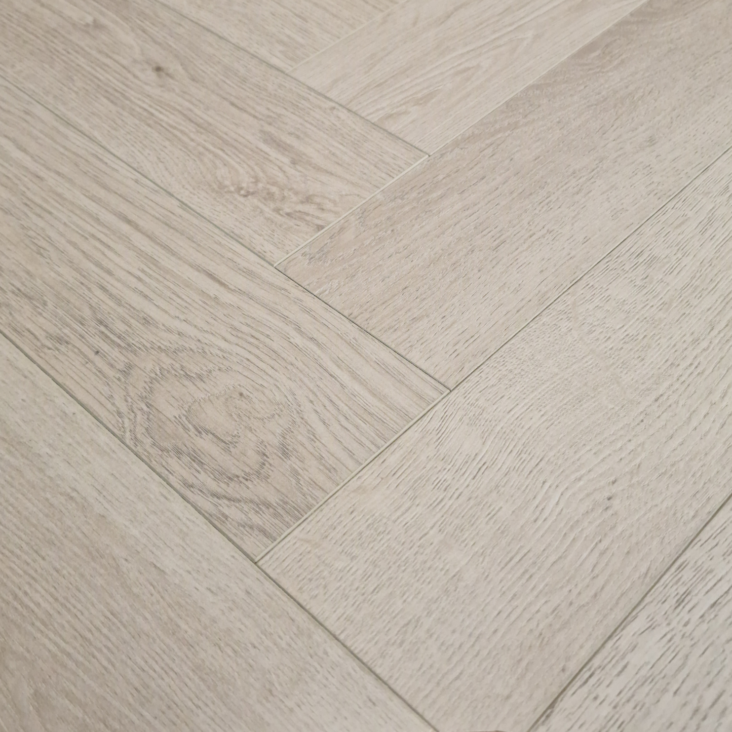 Kingsley 8mm Ashford Oak Herringbone Laminate Flooring
