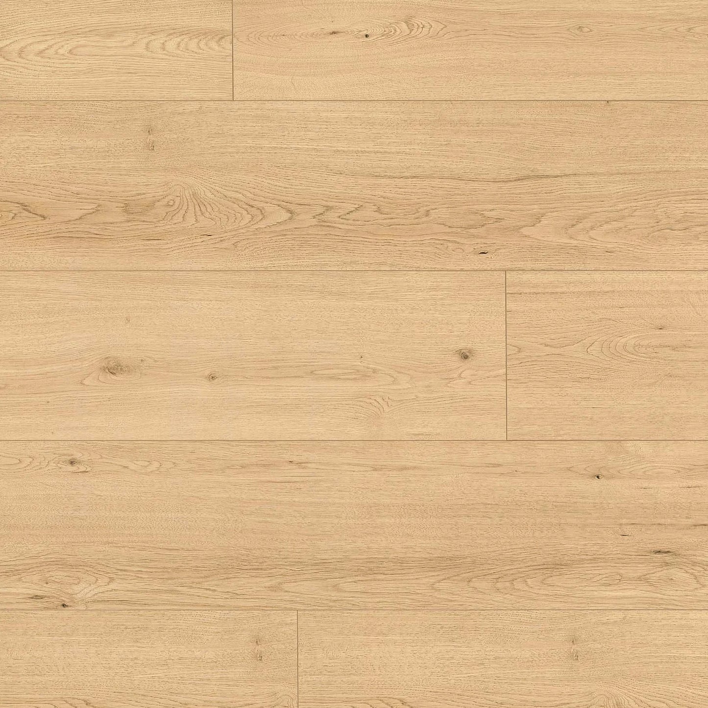 Close-up of wooden flooring with a light brown color and visible grain pattern.